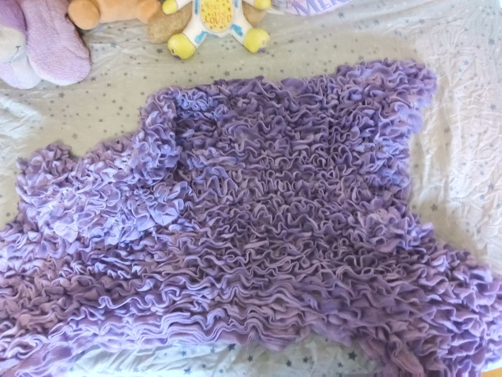 A blanket a dear dear friend made me out of 13 balls of this weird wool. Really was a labour of love.